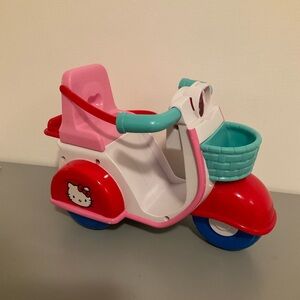 Hello Kitty Chasing rainbows scooter Sanrio
